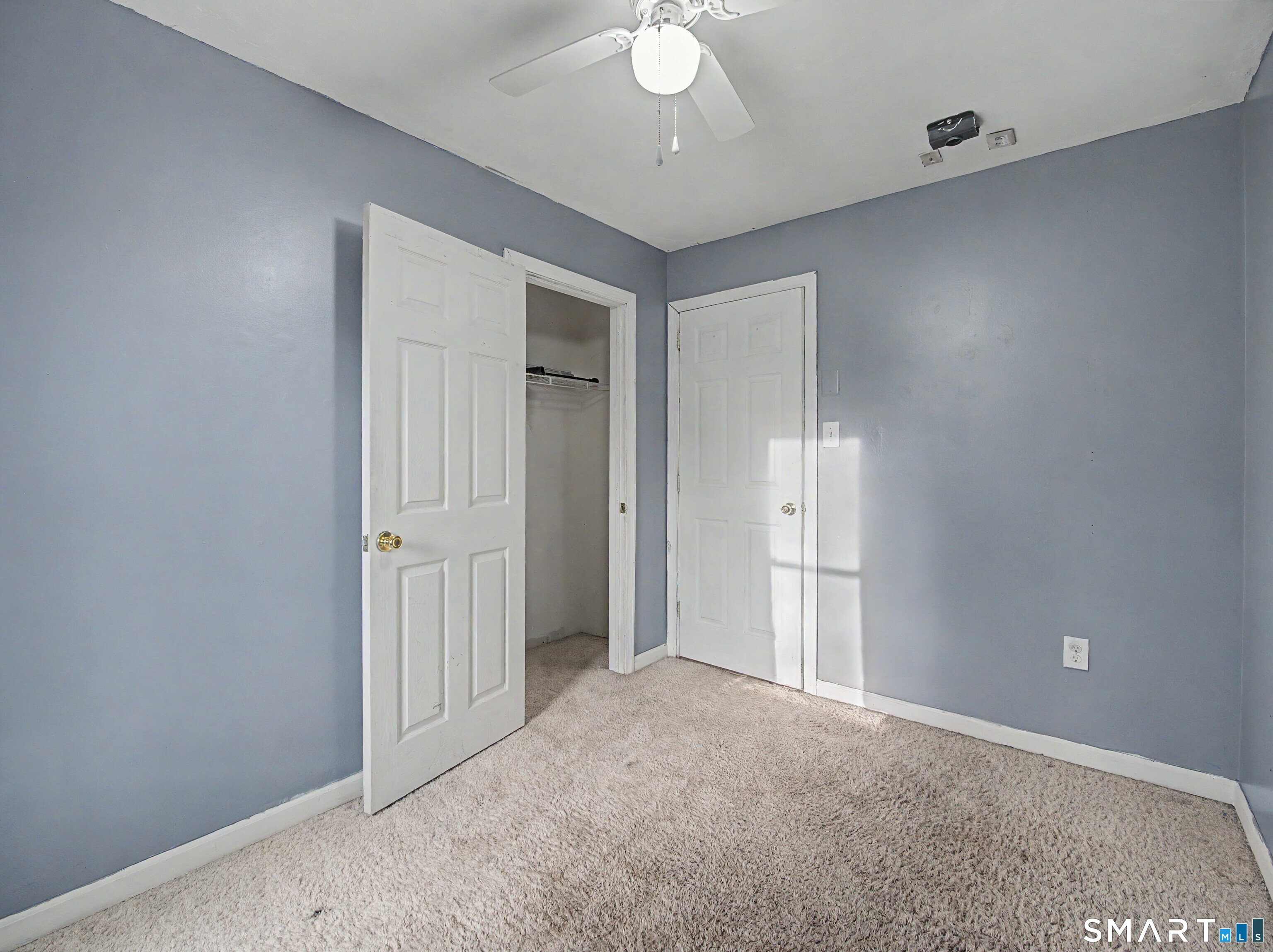 134 Roulin Street Torrington, CT 06790 - Photo 18 of 27 a view of a livingroom with a chandelier fan