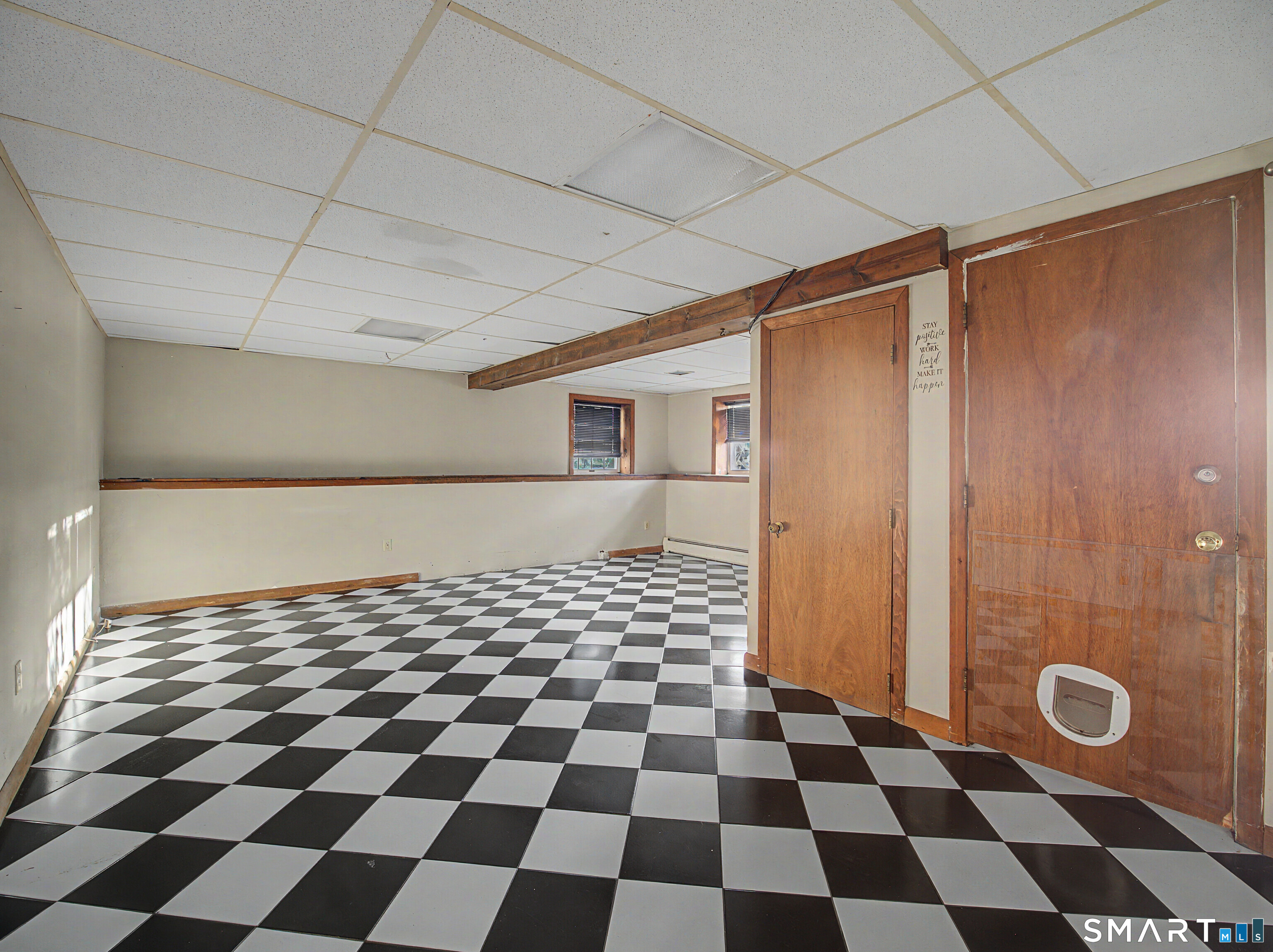 134 Roulin Street Torrington, CT 06790 - Photo 27 of 27 a black and white checkered floor