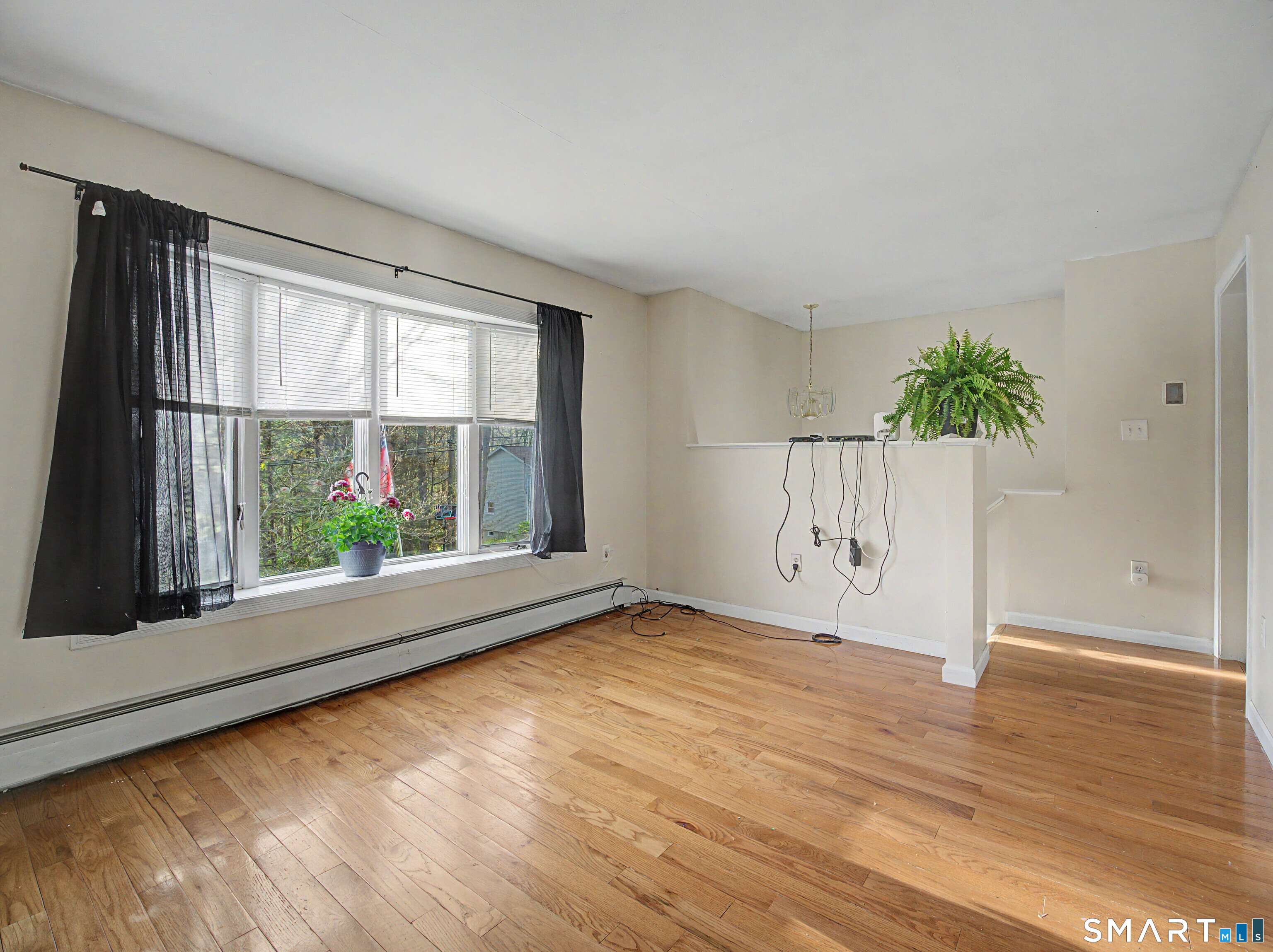 134 Roulin Street Torrington, CT 06790 - Photo 6 of 27 a view of an empty room with a window