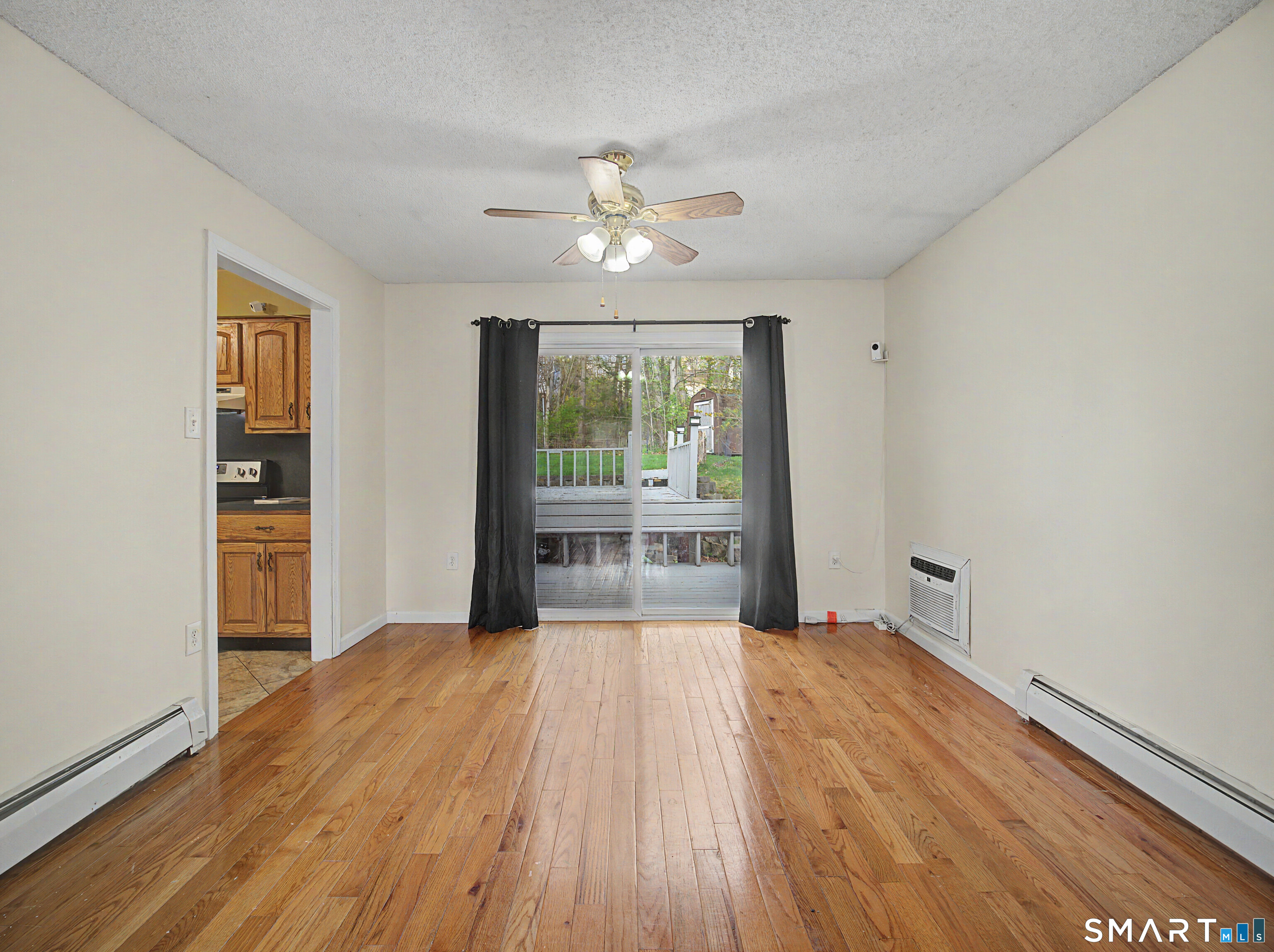 134 Roulin Street Torrington, CT 06790 - Photo 10 of 27 a view of empty room with wooden floor
