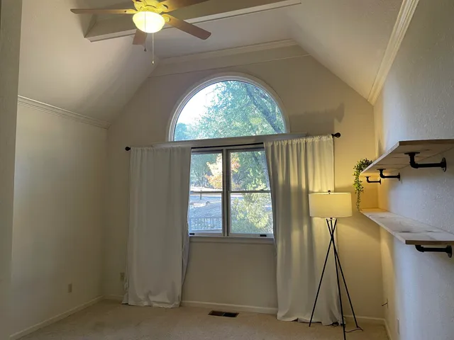 a view of a room with a window