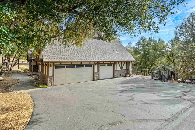 front view of house with a trees