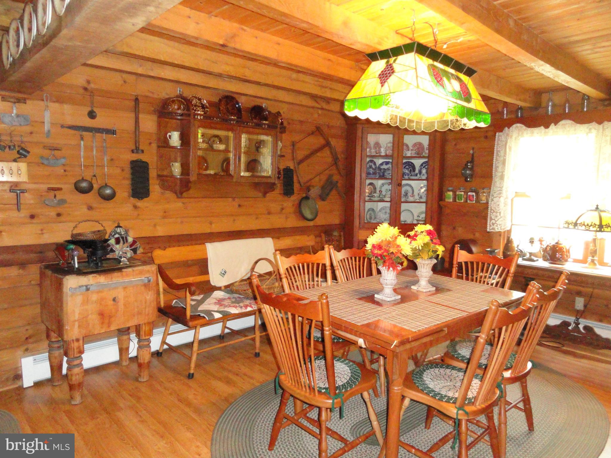 102 Stone Road Barto, PA 19504 - Photo 16 of 49 Dining room with hardwood floor and beamed ceiling