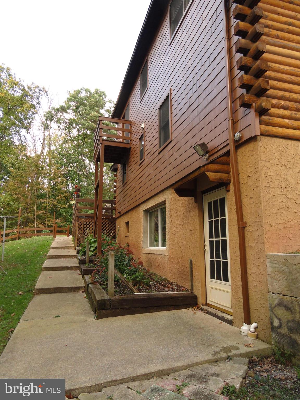 102 Stone Road Barto, PA 19504 - Photo 43 of 49 Walkway from driveway to rear door from basement.