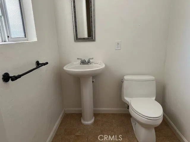 a view of a garden with a iron fence