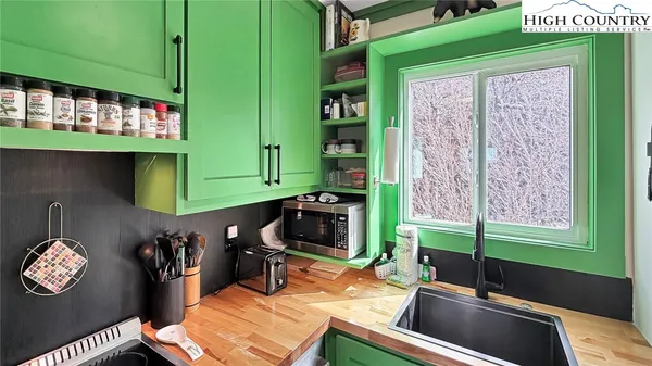 a room with furniture and a window