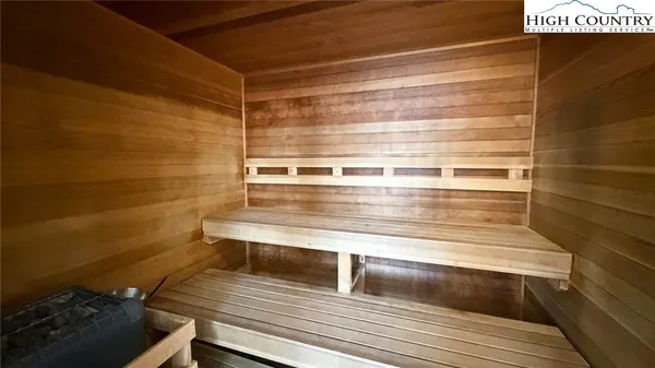 a kitchen with stainless steel appliances a refrigerator sink and cabinets