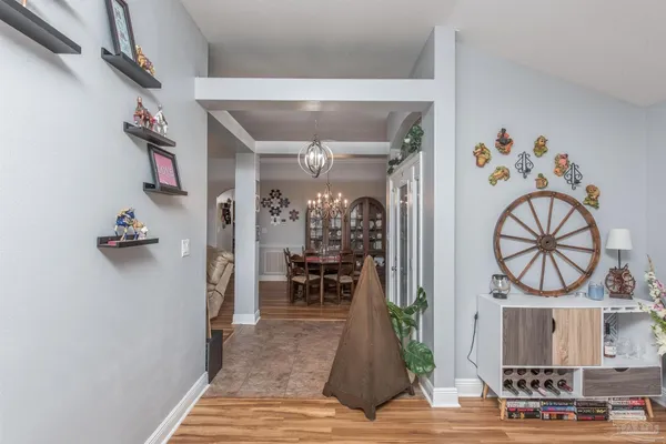 a view of entryway with wooden floor