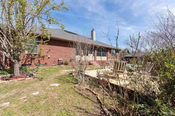 a house with trees in front of it