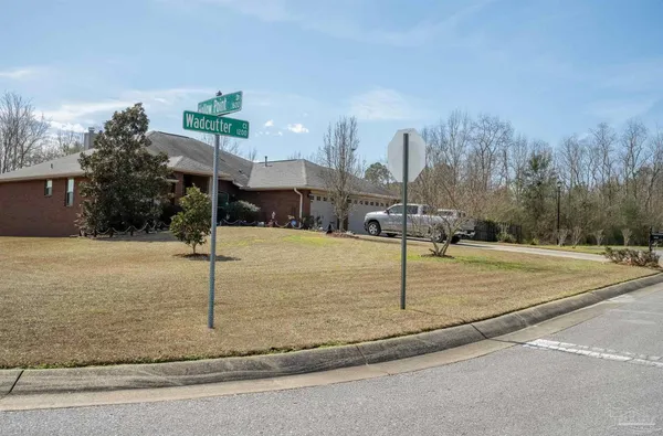 a street sign that is on a wall
