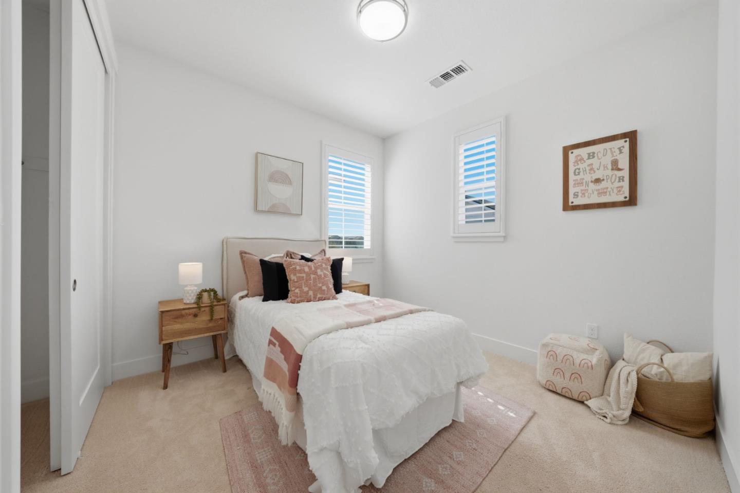 37517 Bay Crest Road Newark, CA 94560 - Photo 56 of 88 a bedroom with a bed and a lamp
