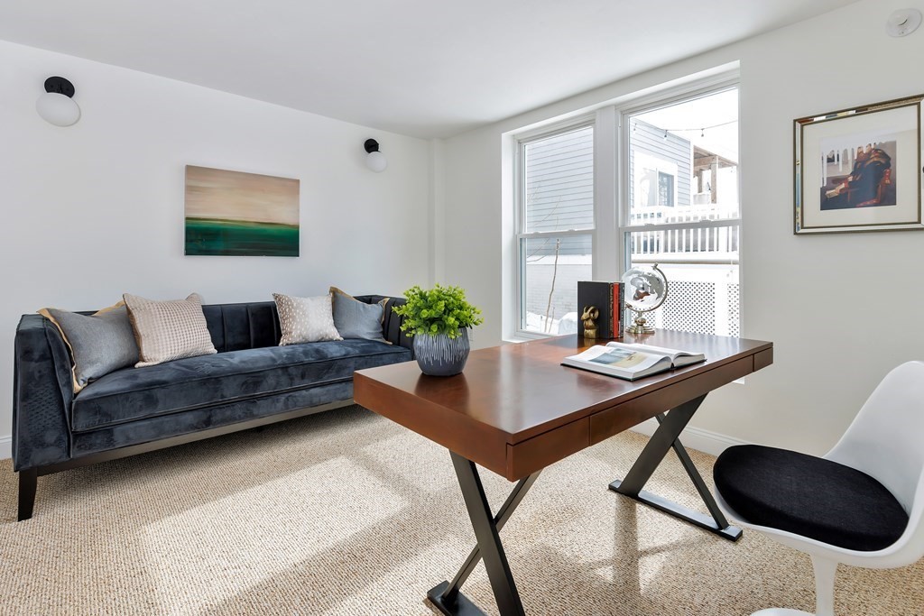 24 Adams Street, Unit 5 Somerville, MA 02145 - Photo 20 of 28 a living room with furniture and a potted plant