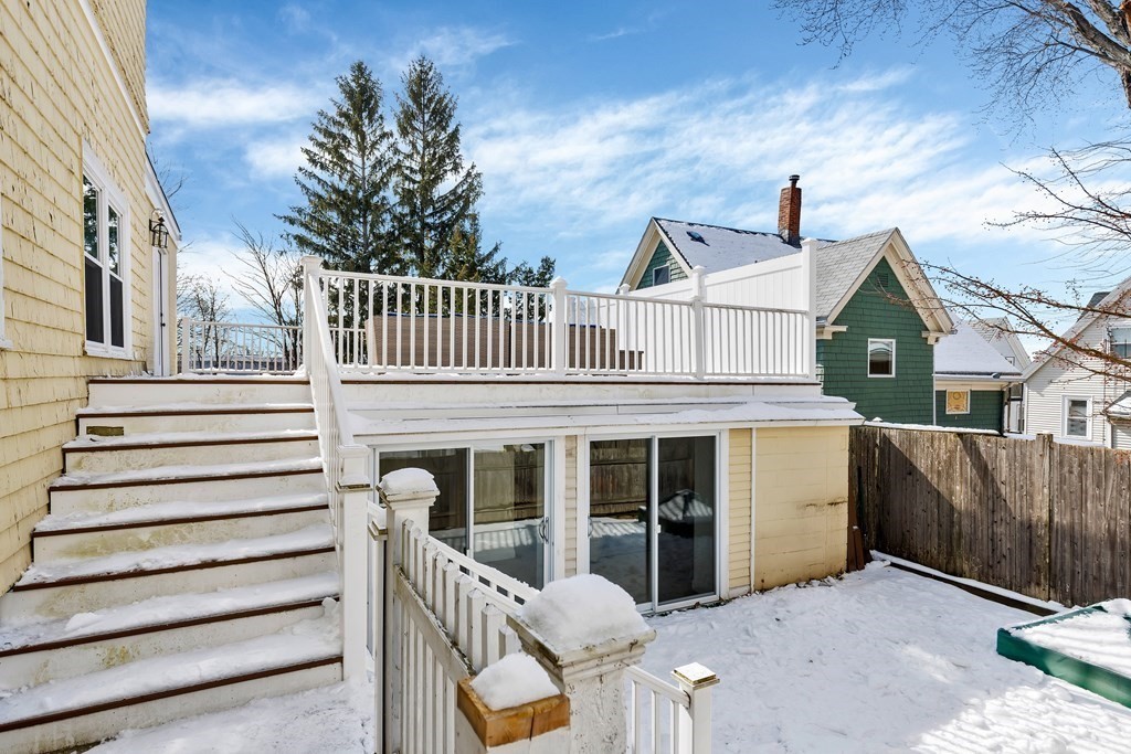 24 Adams Street, Unit 5 Somerville, MA 02145 - Photo 27 of 28 a view of a house with a porch