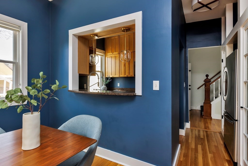 24 Adams Street, Unit 5 Somerville, MA 02145 - Photo 6 of 28 a dining room with furniture and potted plant