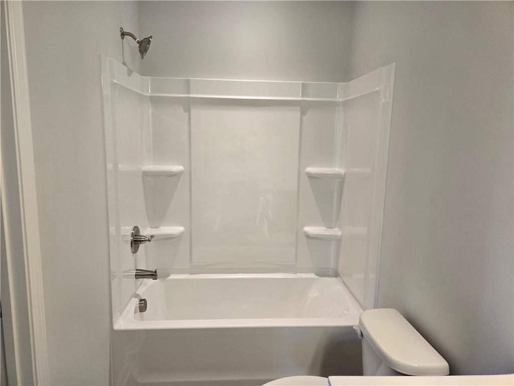 304 Westfall Terrace Loganville, GA 30052 - Photo 20 of 50 a bathroom with a bathtub