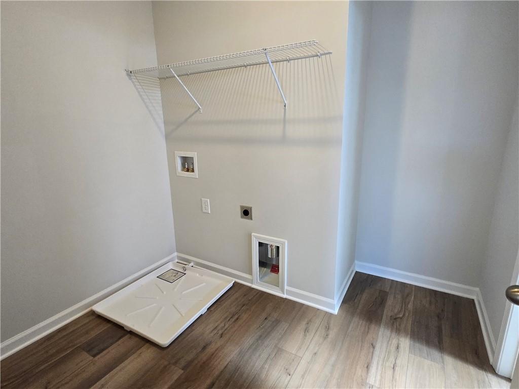 304 Westfall Terrace Loganville, GA 30052 - Photo 28 of 50 a view of an empty room and wooden floor