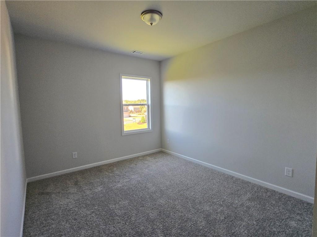 304 Westfall Terrace Loganville, GA 30052 - Photo 33 of 50 an empty room with windows