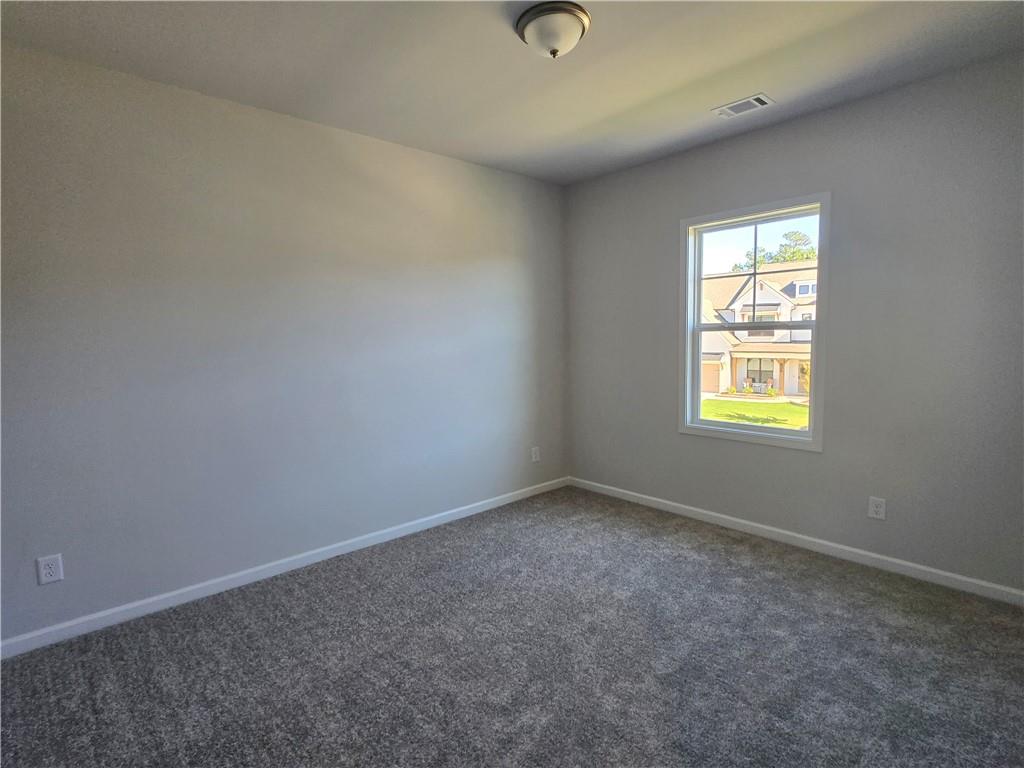 304 Westfall Terrace Loganville, GA 30052 - Photo 34 of 50 an empty room with a window