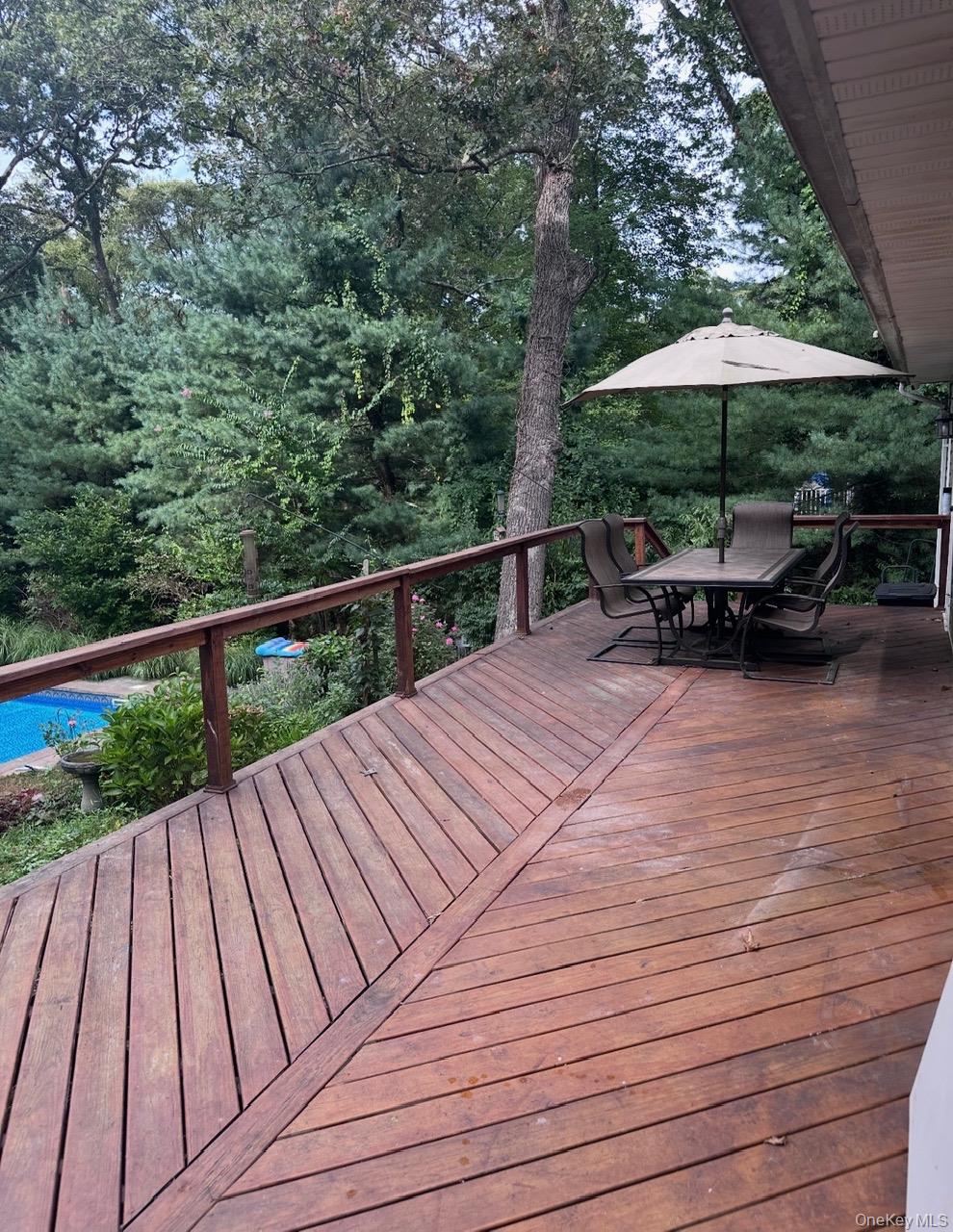 19 New Mill Road Smithtown, NY 11787 - Photo 13 of 13 a view of backyard with sitting area