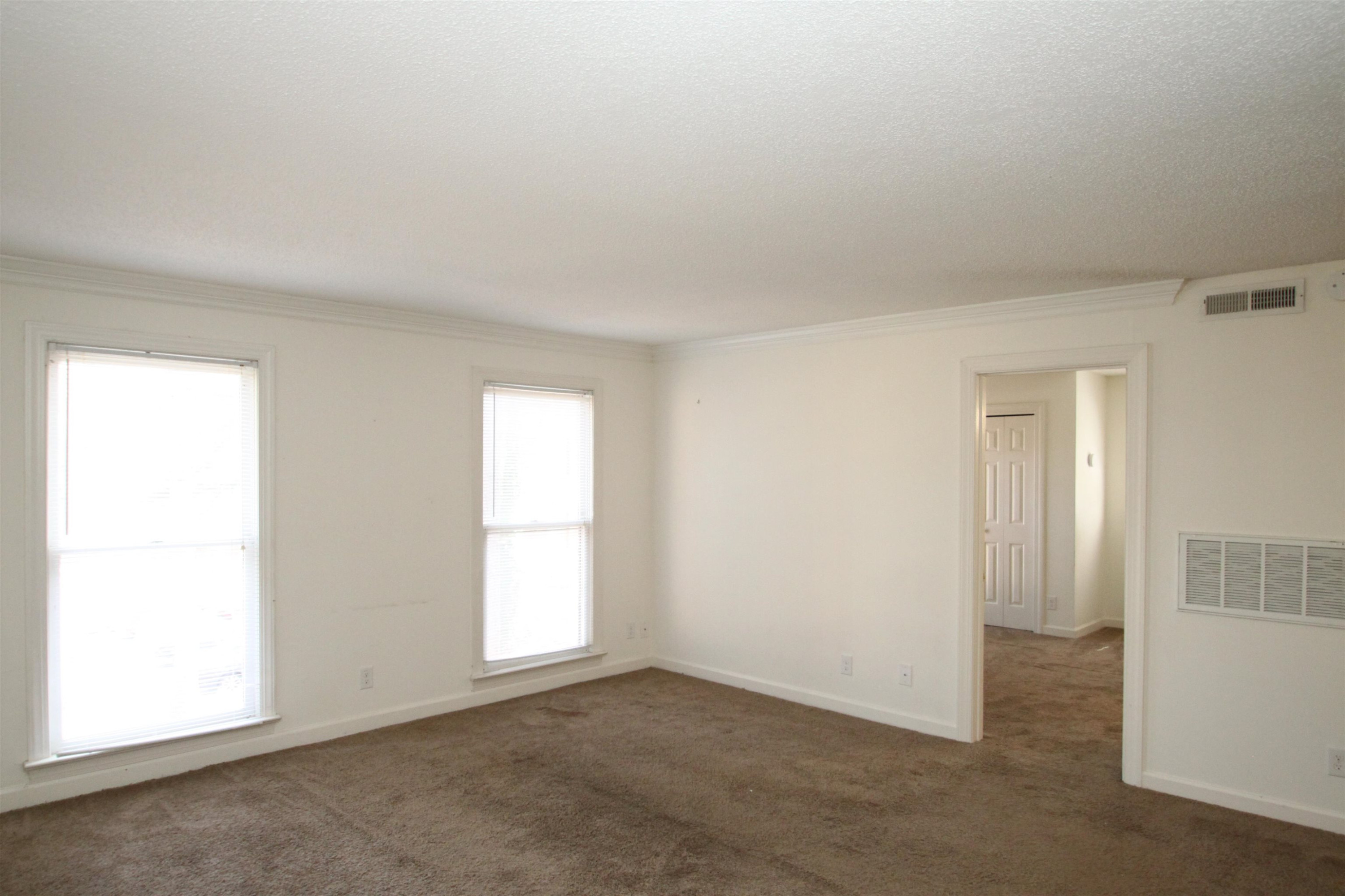 3537 Ivy Commons Drive, Unit 202 Raleigh, NC 27606 - Photo 51 of 51 Enjoy this open floor plan with a spacious living room that is open to the kitchen and dining areas. Living Room