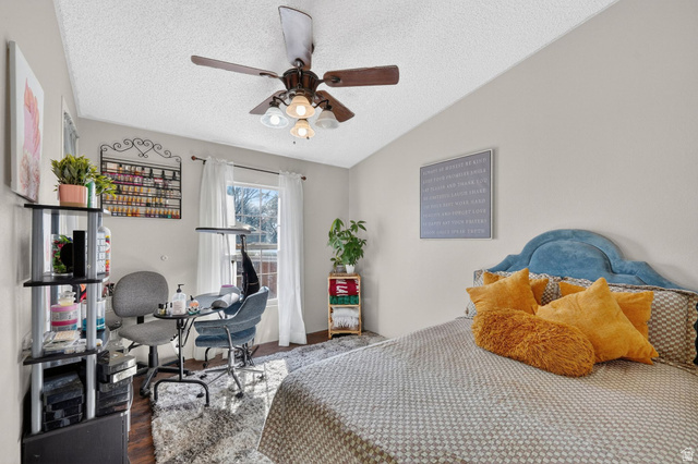 269 Mindella Way, Unit A Layton, UT 84041 - Photo 14 of 37 Bedroom featuring a ceiling fan, wood finished floors, and an office area