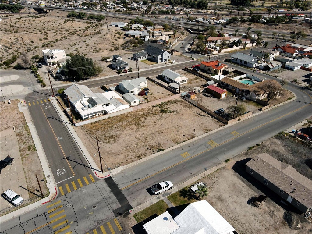 1510 Washington Street Needles, CA 92363 - Photo 15 of 35 an aerial view of multiple houses with yard
