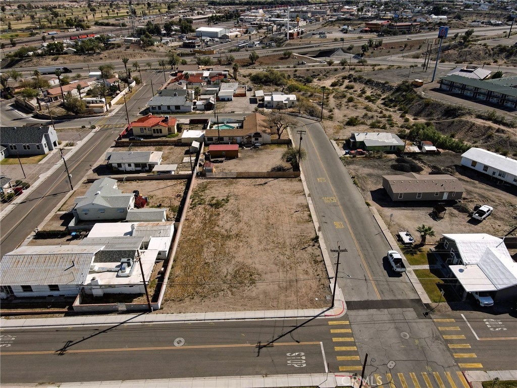 1510 Washington Street Needles, CA 92363 - Photo 6 of 35 an aerial view of residential houses with outdoor space