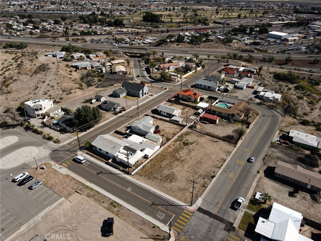 1510 Washington Street Needles, CA 92363 - Photo 9 of 35 an aerial view of residential houses with outdoor space