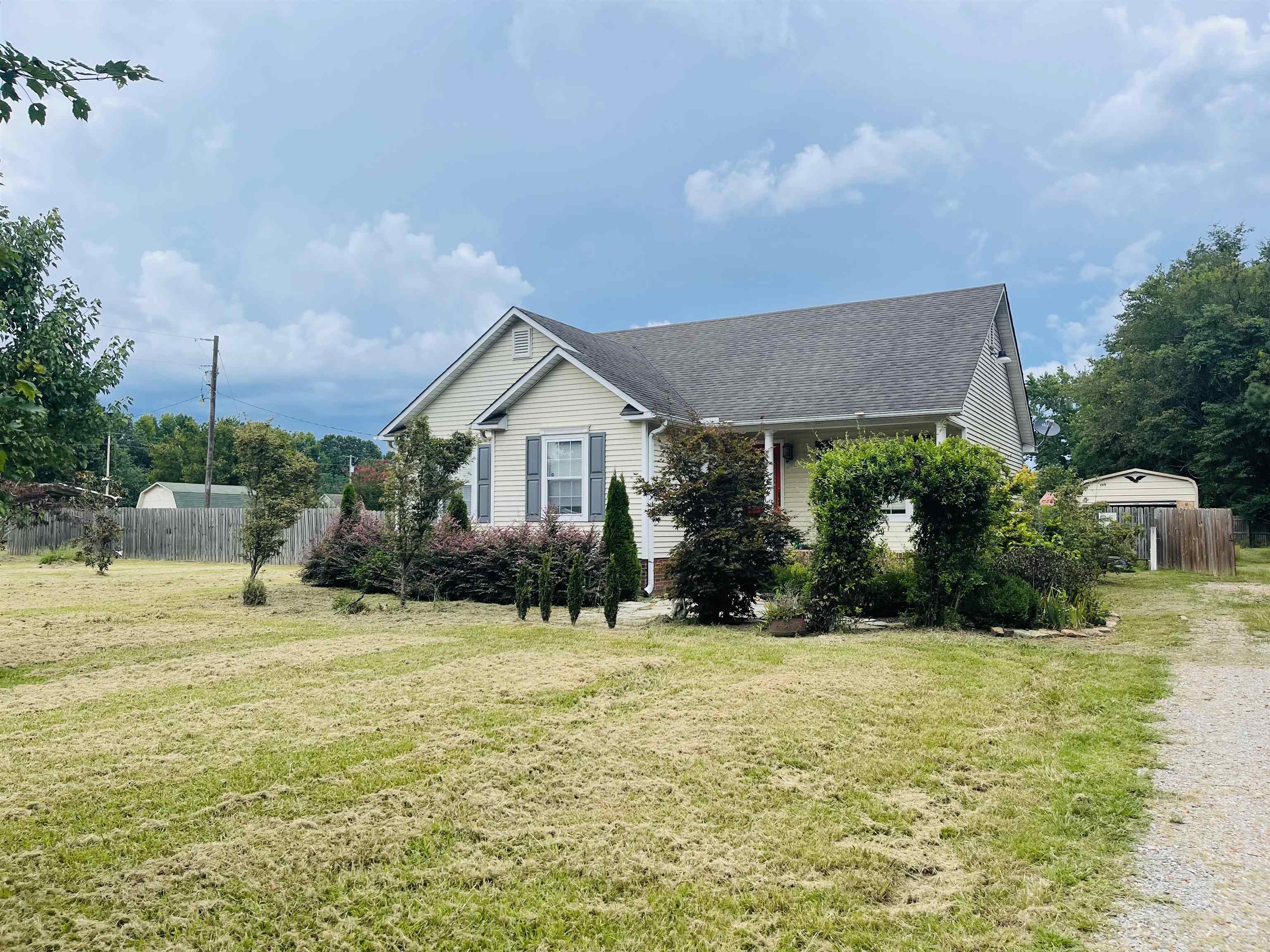 50 Eric Lane West Ramer, TN 38367 - Photo 14 of 19 a view of a house with a big yard and potted plants
