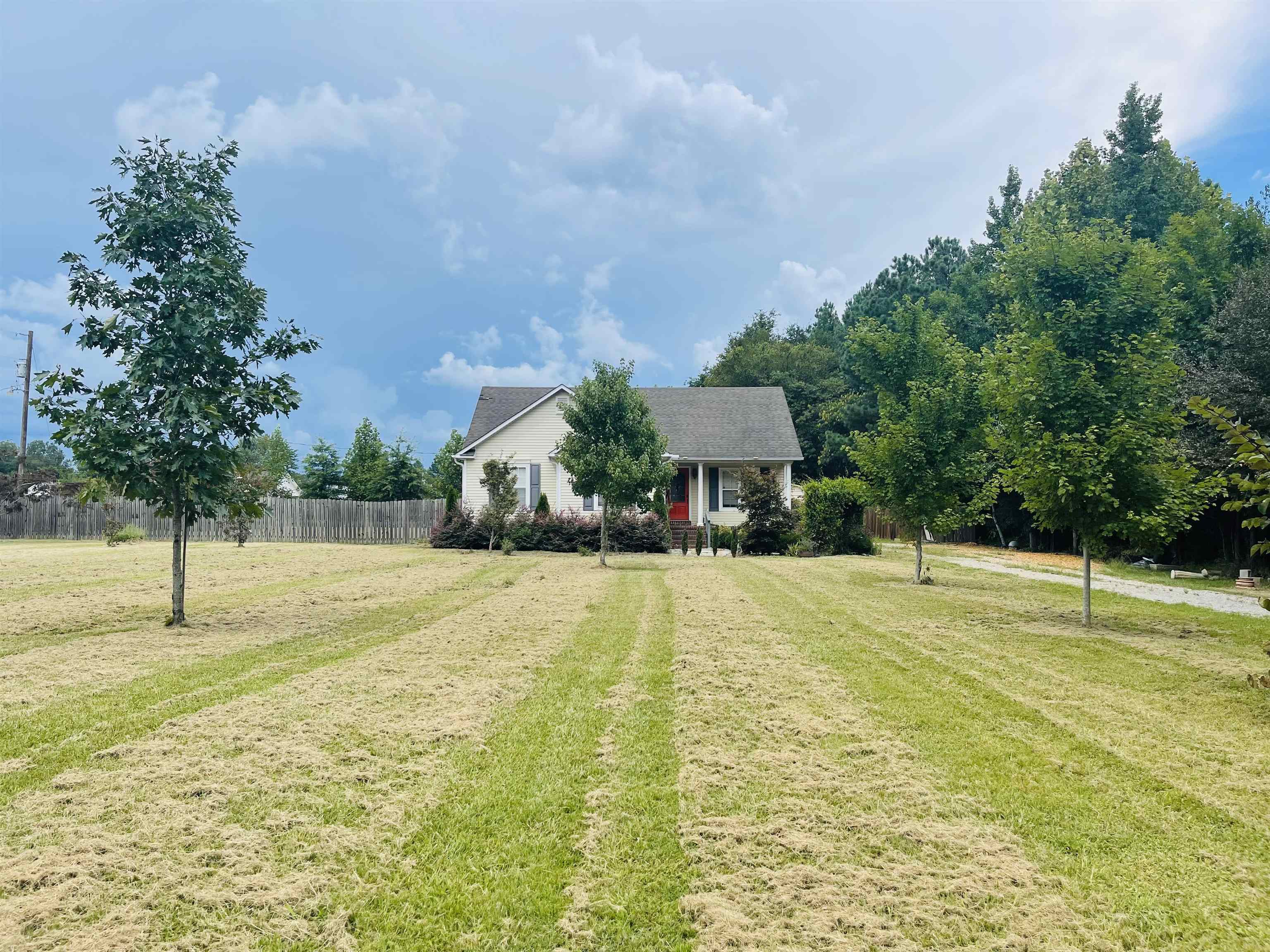50 Eric Lane West Ramer, TN 38367 - Photo 17 of 19 a swimming pool with a yard and seating area