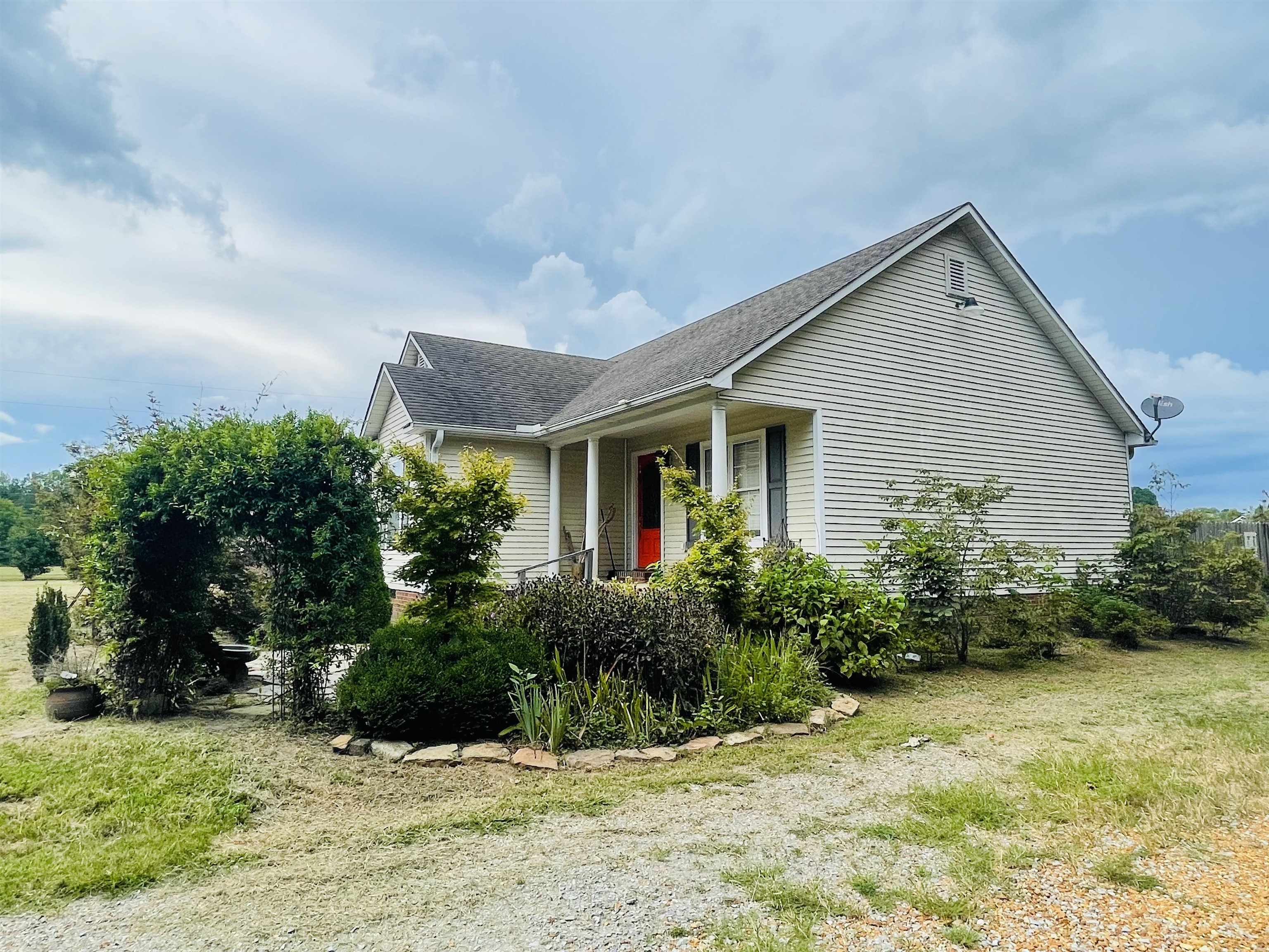 50 Eric Lane West Ramer, TN 38367 - Photo 18 of 19 a front view of house with yard and green space