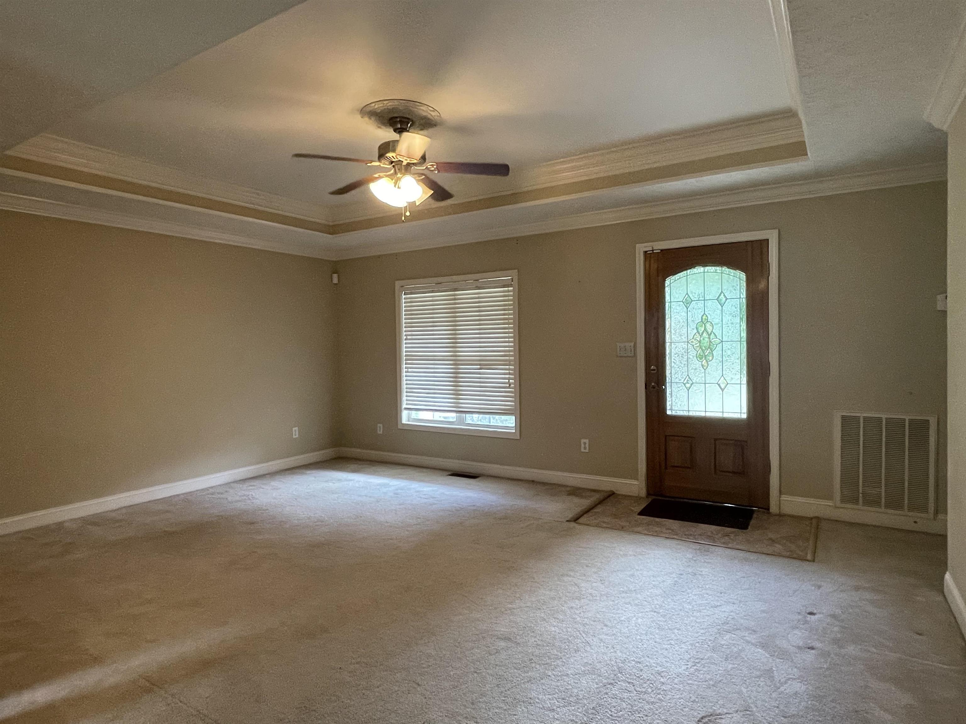 50 Eric Lane West Ramer, TN 38367 - Photo 4 of 19 an empty room with windows and fan