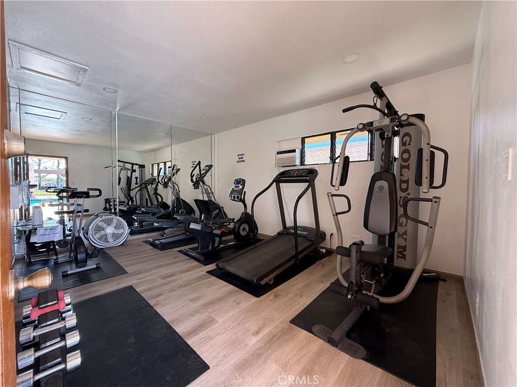 27250 Murrieta Road, Unit 51 Menifee, CA 92586 - Photo 11 of 15 a view of a room with gym equipment