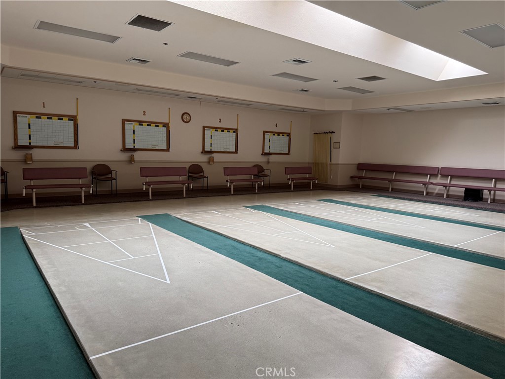 27250 Murrieta Road, Unit 51 Menifee, CA 92586 - Photo 13 of 15 a living room with furniture and a rug