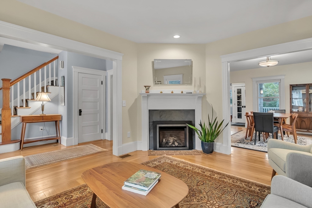 51 Ronald Road Arlington, MA 02474 - Photo 5 of 30 a living room with furniture and a fireplace