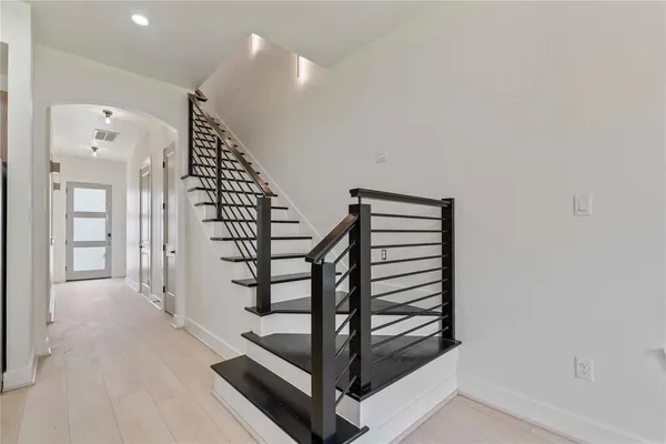a view of a hallway with entryway