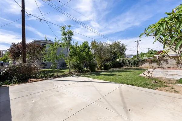 a view of a garden with a pathway