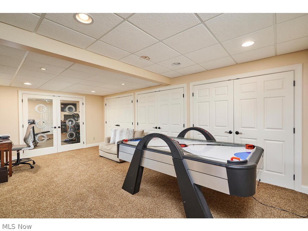 3735 Roberts Ridge Akron, OH 44333 - Photo 27 of 45 Lower Level Recreation room with carpet flooring and a paneled ceiling