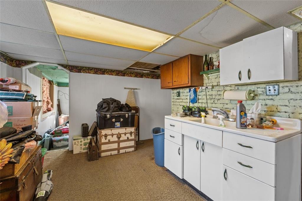 801 Bower Hill Road Bridgeville, PA 15017 - Photo 20 of 34 a utility room with sink dryer and washer