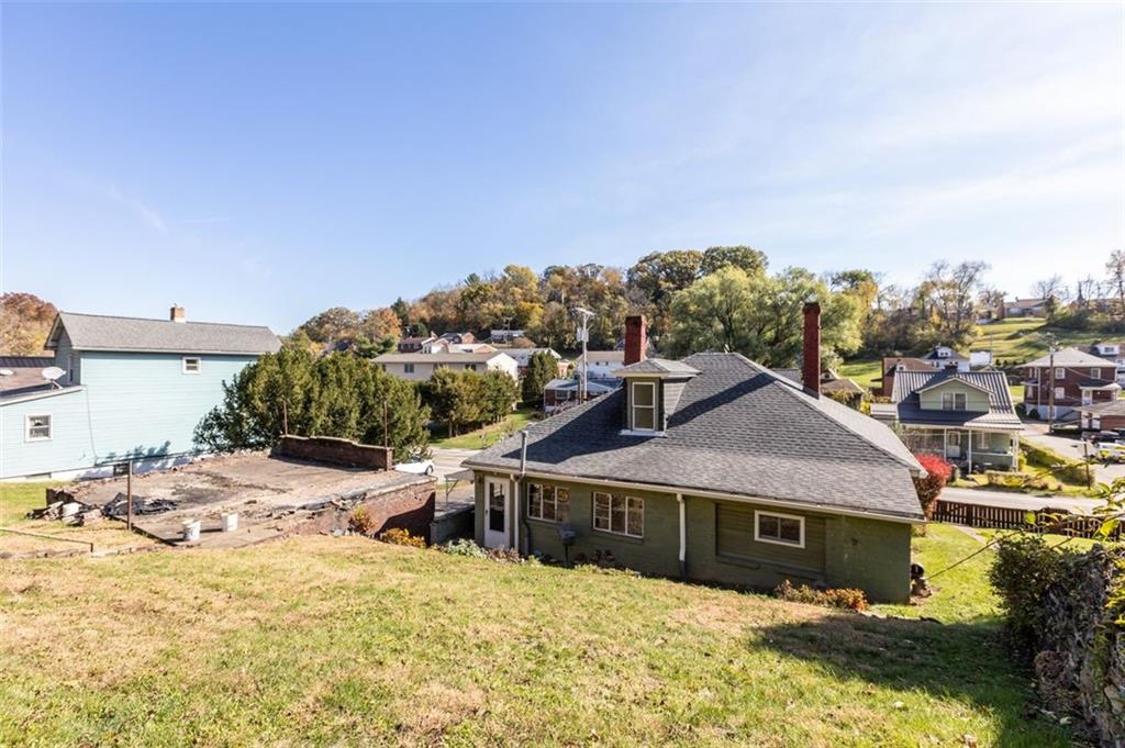 801 Bower Hill Road Bridgeville, PA 15017 - Photo 33 of 34 a view of a house with a snow in the background