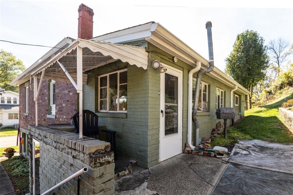 801 Bower Hill Road Bridgeville, PA 15017 - Photo 4 of 34 a front view of a house with garden