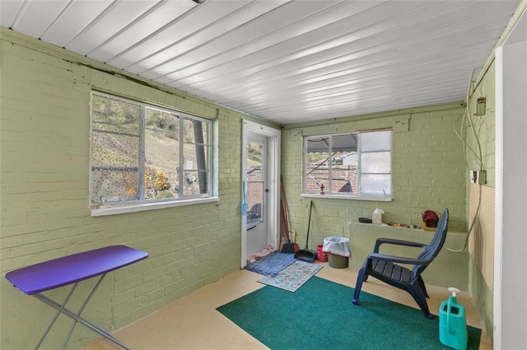 801 Bower Hill Road Bridgeville, PA 15017 - Photo 6 of 34 a room with furniture and a window