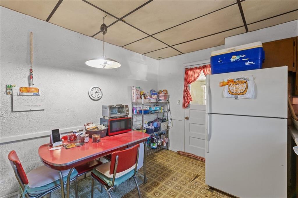 801 Bower Hill Road Bridgeville, PA 15017 - Photo 9 of 34 a room with storage and utility