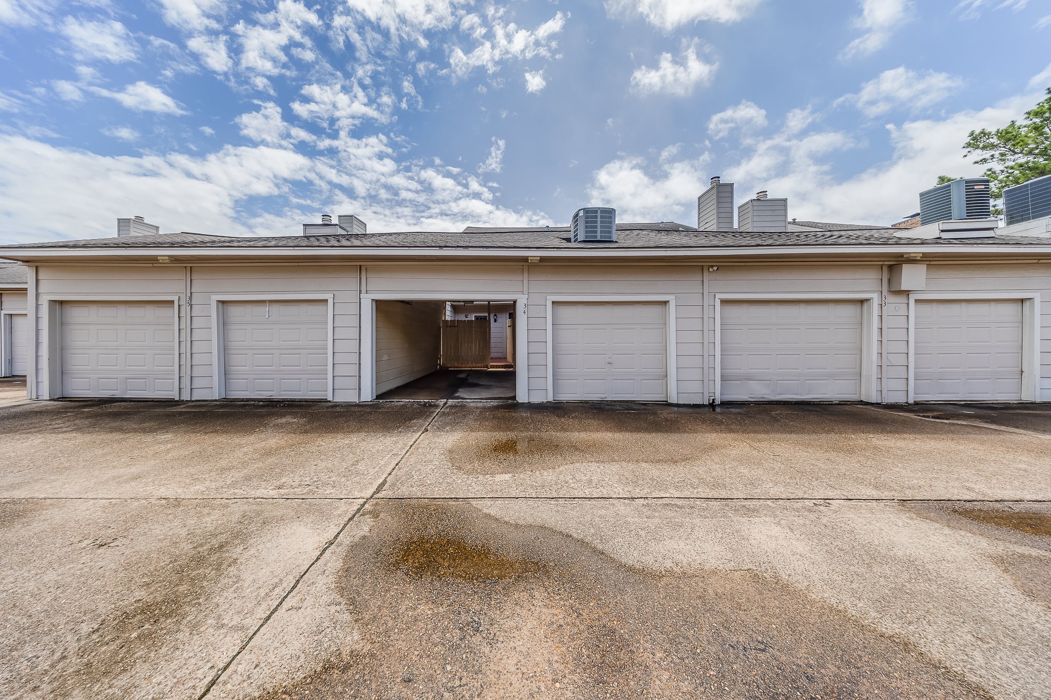 727 Bunker Hill Road, Unit 34 Houston, TX 77024 - Photo 37 of 38 Both garages are side by side.