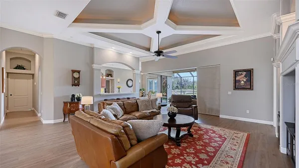 a living room with furniture and a rug