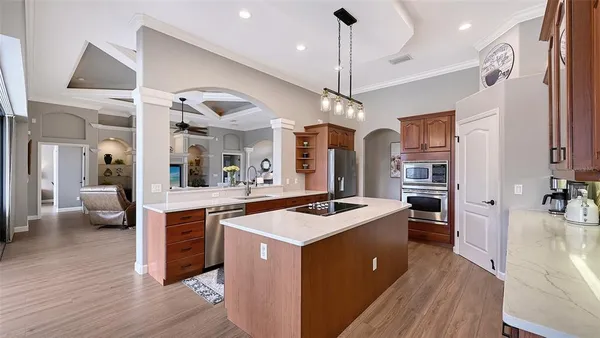 a dining room with furniture window and wooden floor