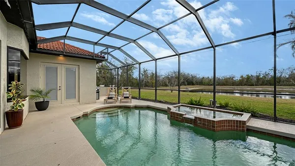 a view of a golf course with a lake