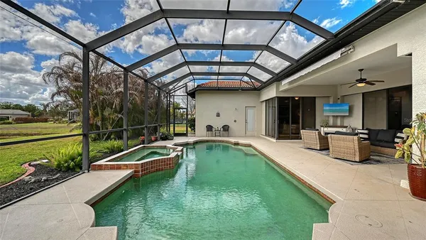 a view of a lake with houses in the background