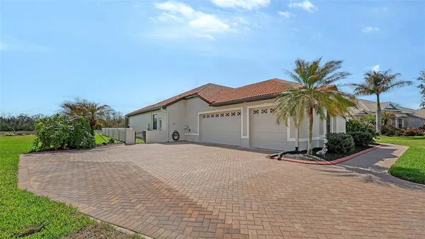 an aerial view of a house with a garden