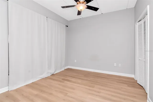 a view of an empty room with a window